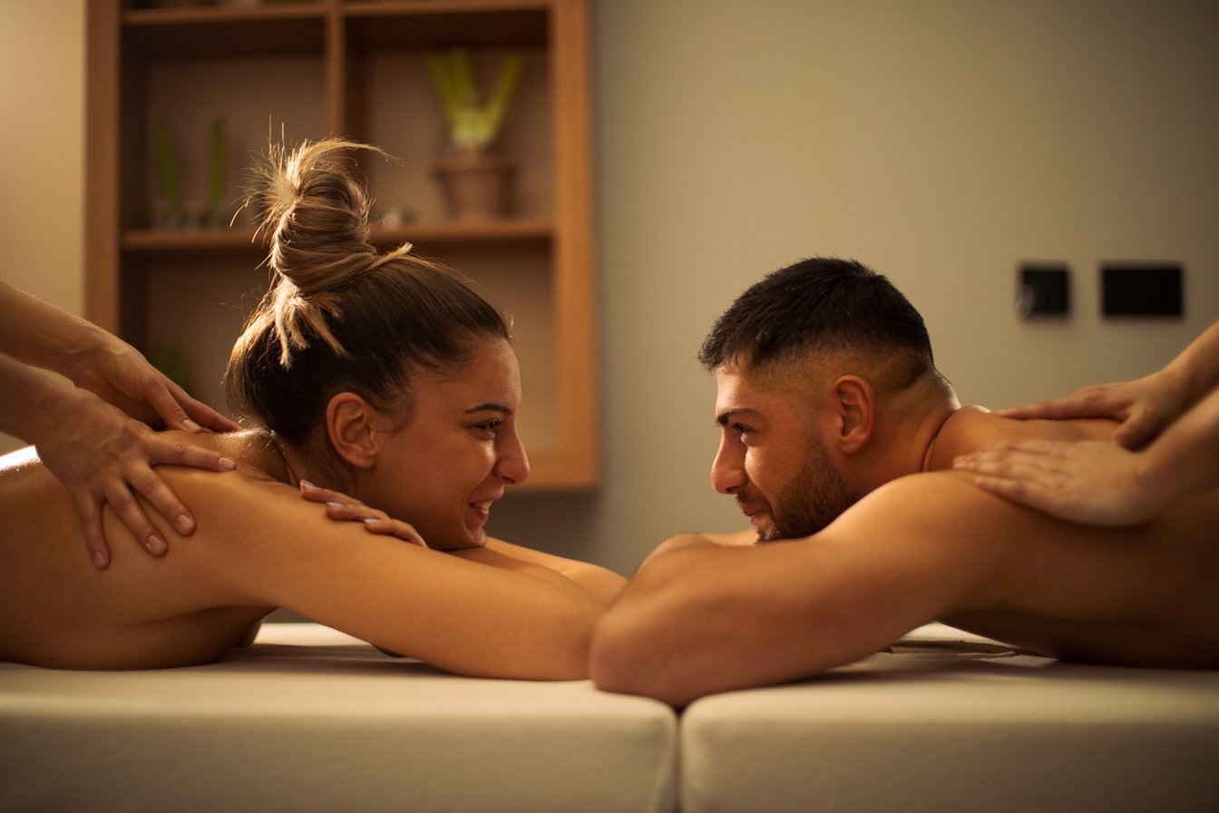 Young couple enjoying massage together